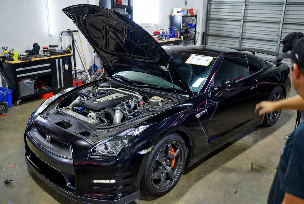 GT-R Proto hood vent forward positioning and width detail versus production car
