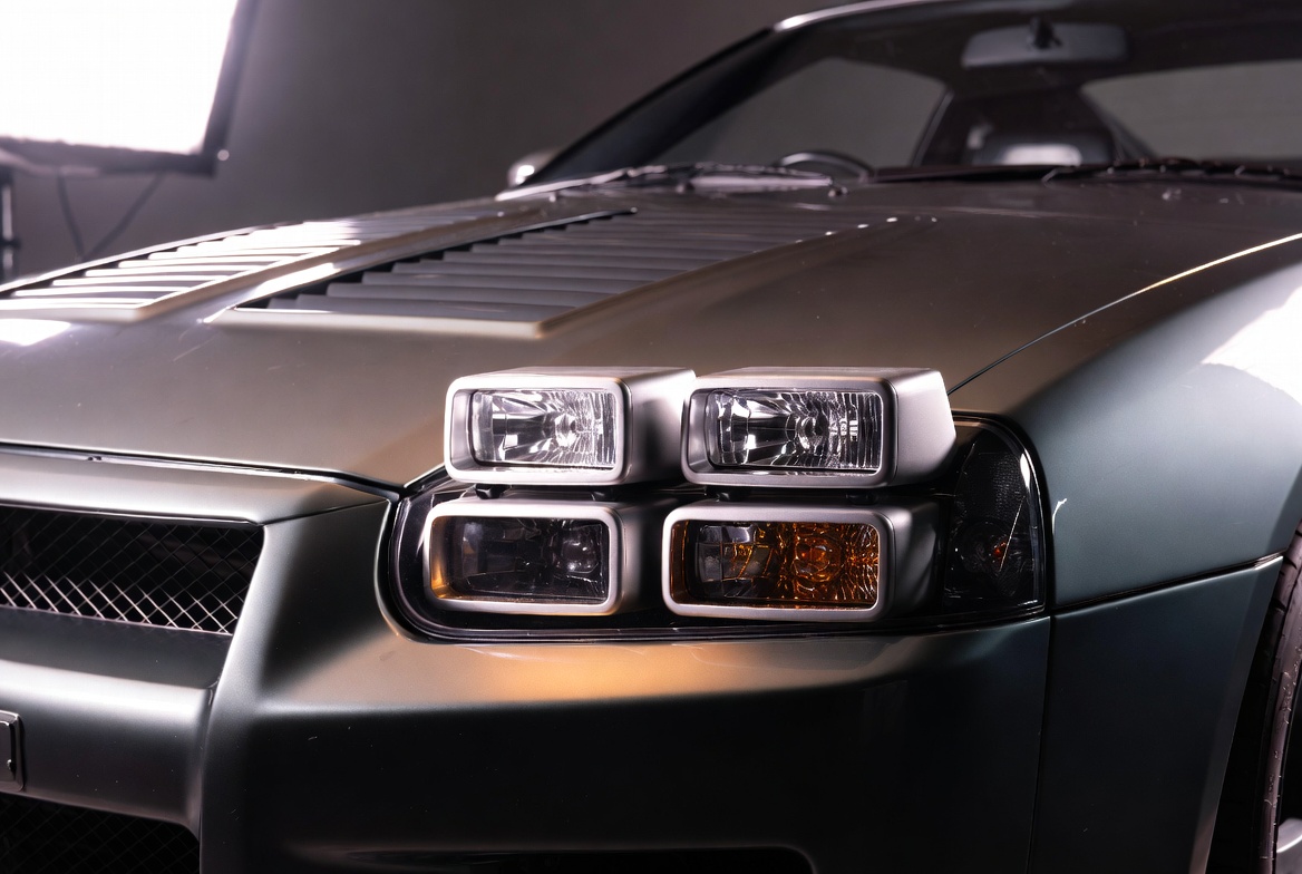 R35 GT-R at golden hour on an open road — Proto engineering spirit visible in every line