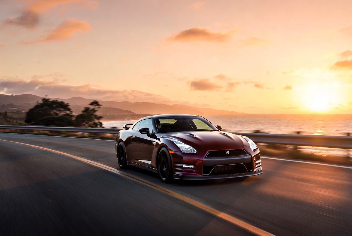 R35 GT-R engine bay during modification build stage with intake and supporting components